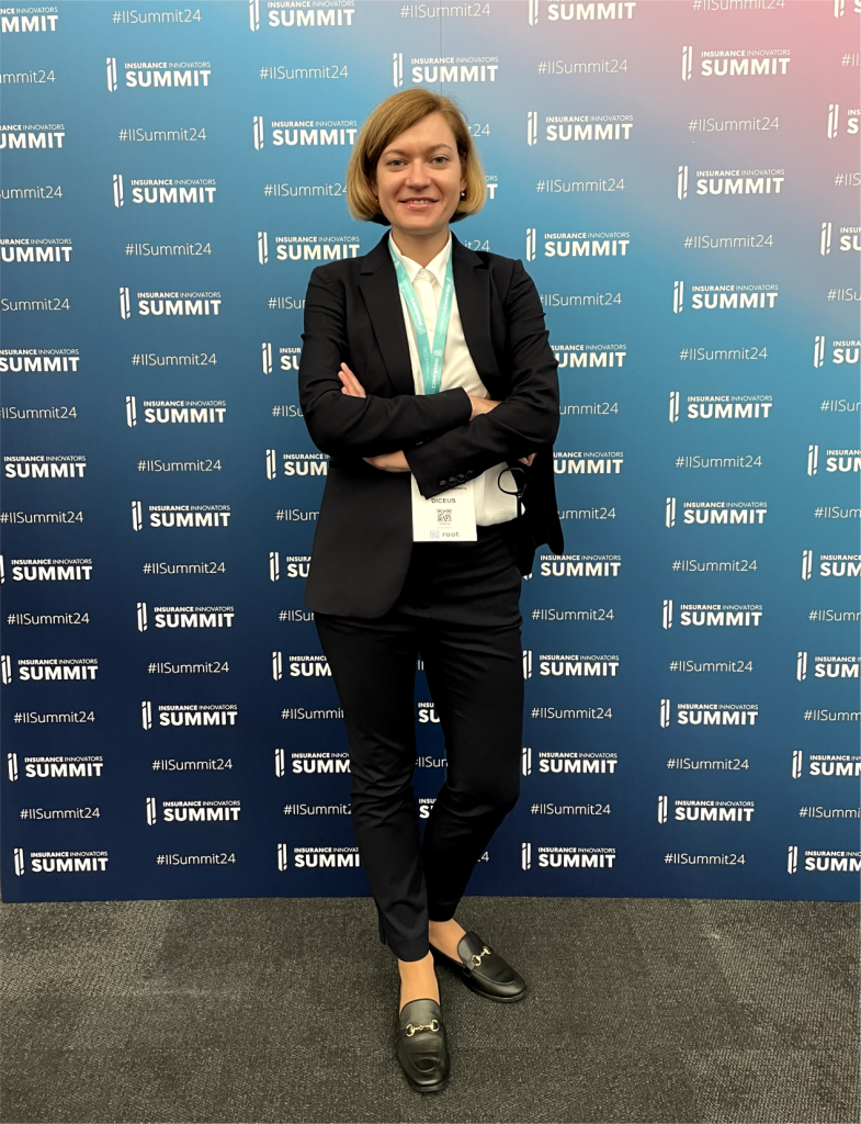 Kateryna by Insurance Summit backdrop