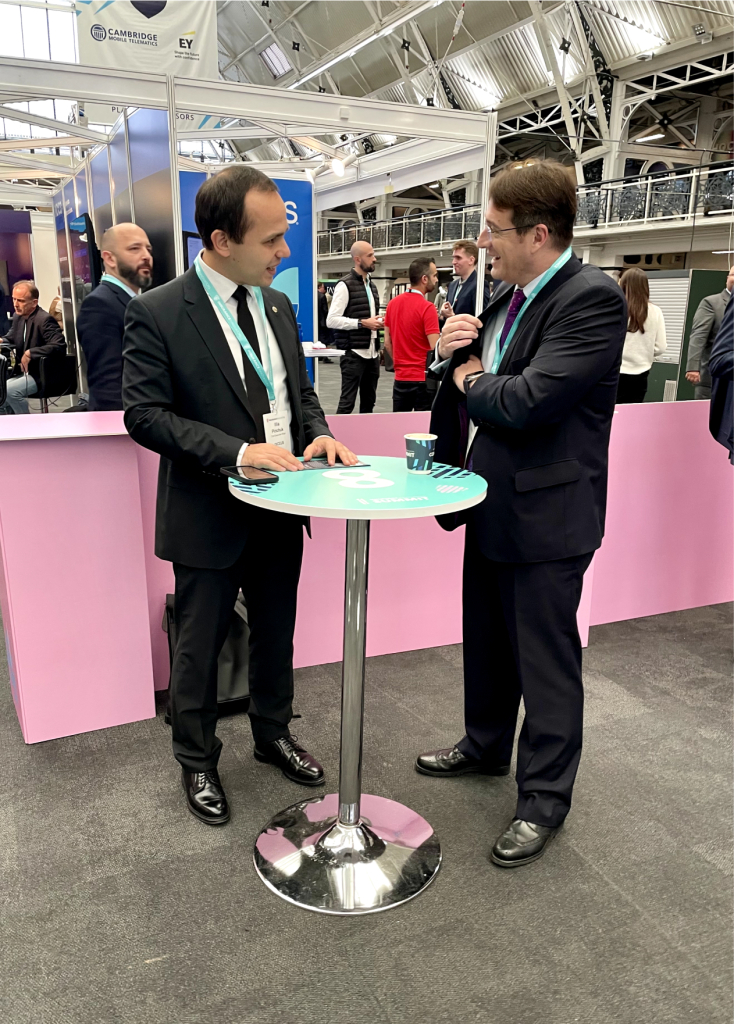 Illia Pinchuk chats with an insurance exec